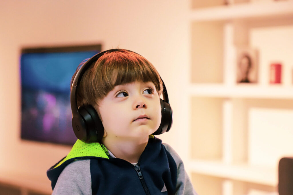 child wearing headphones